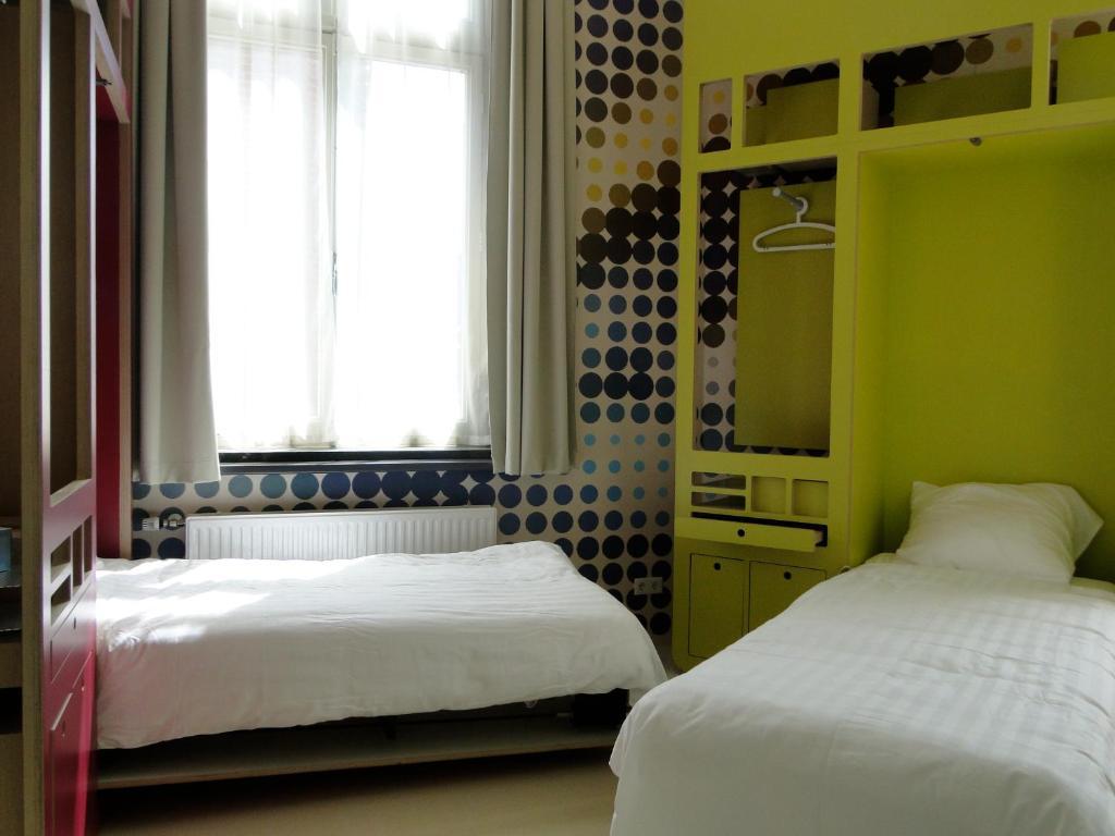 Tweepersoonskamer met 2 Aparte Bedden
